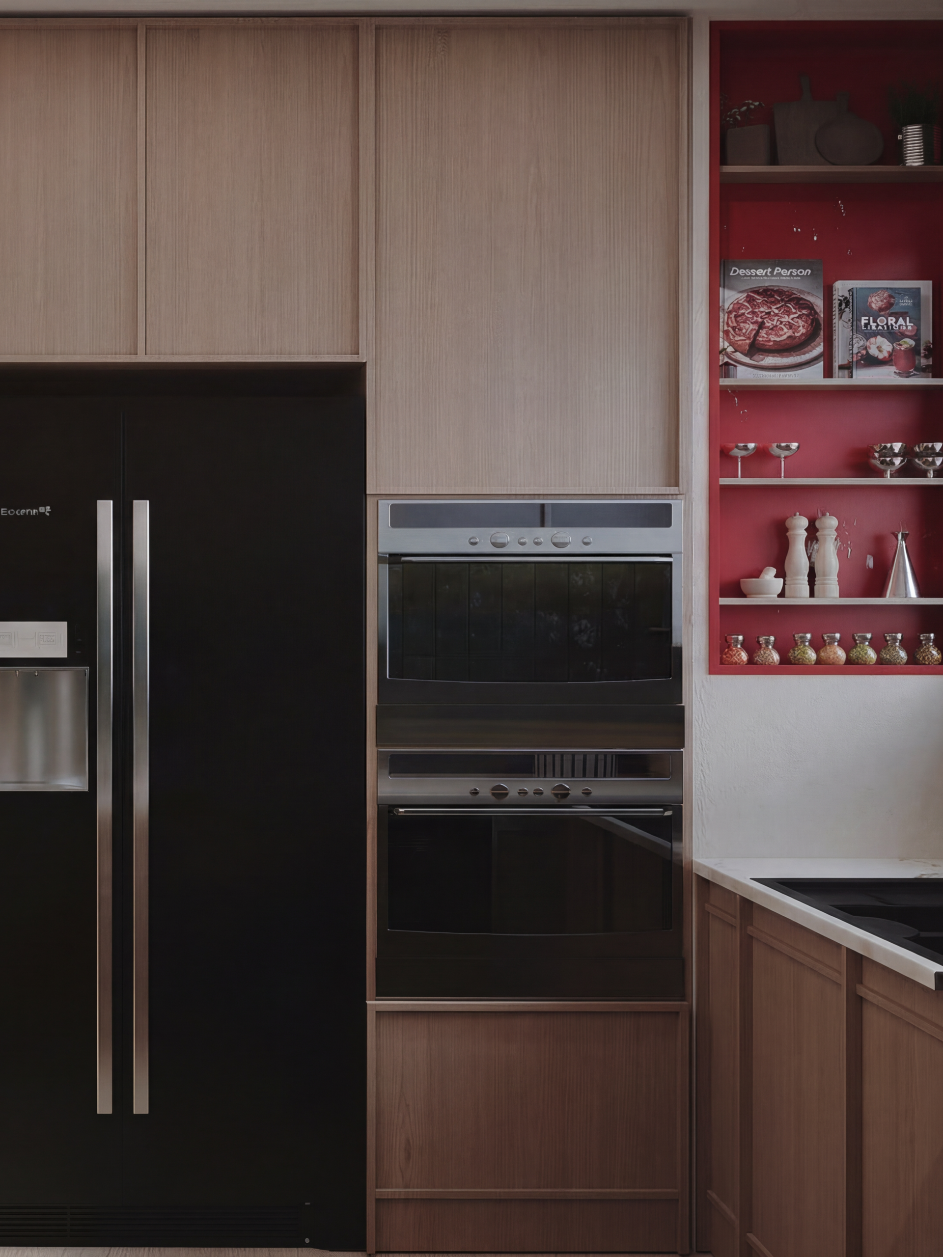 Built-in refrigerator area with custom cabinetry and clean modern kitchen detailing